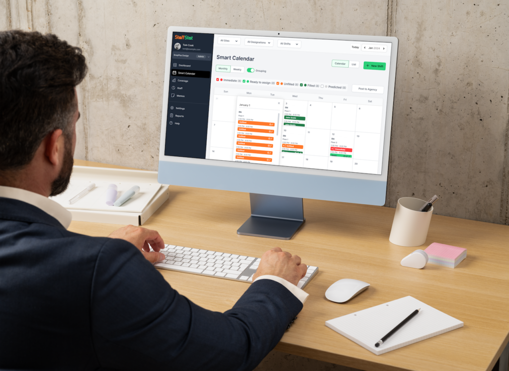 Healthcare employee using smart scheduling software for management of operation.